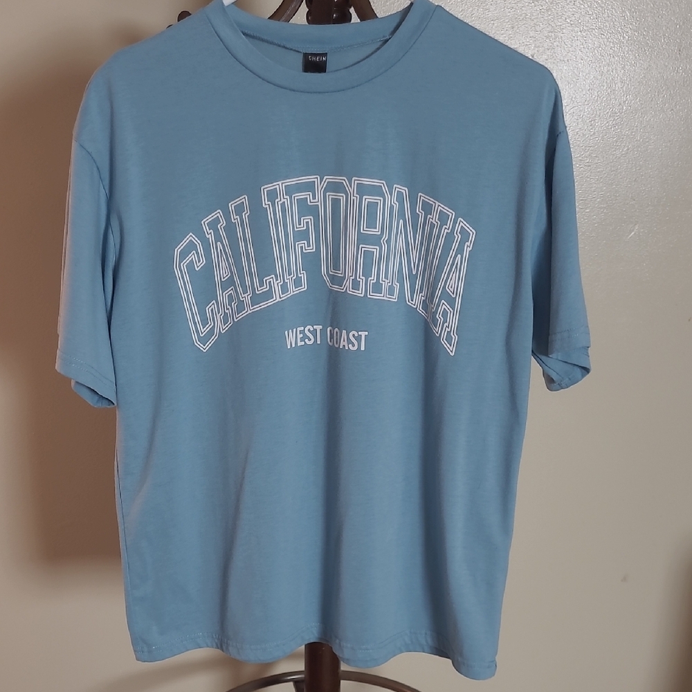 Light blue oversized t-shirt from SHEIN featuring a "California West Coast"